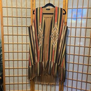 Fashion express, beautiful western long fringe vest in perfect condition